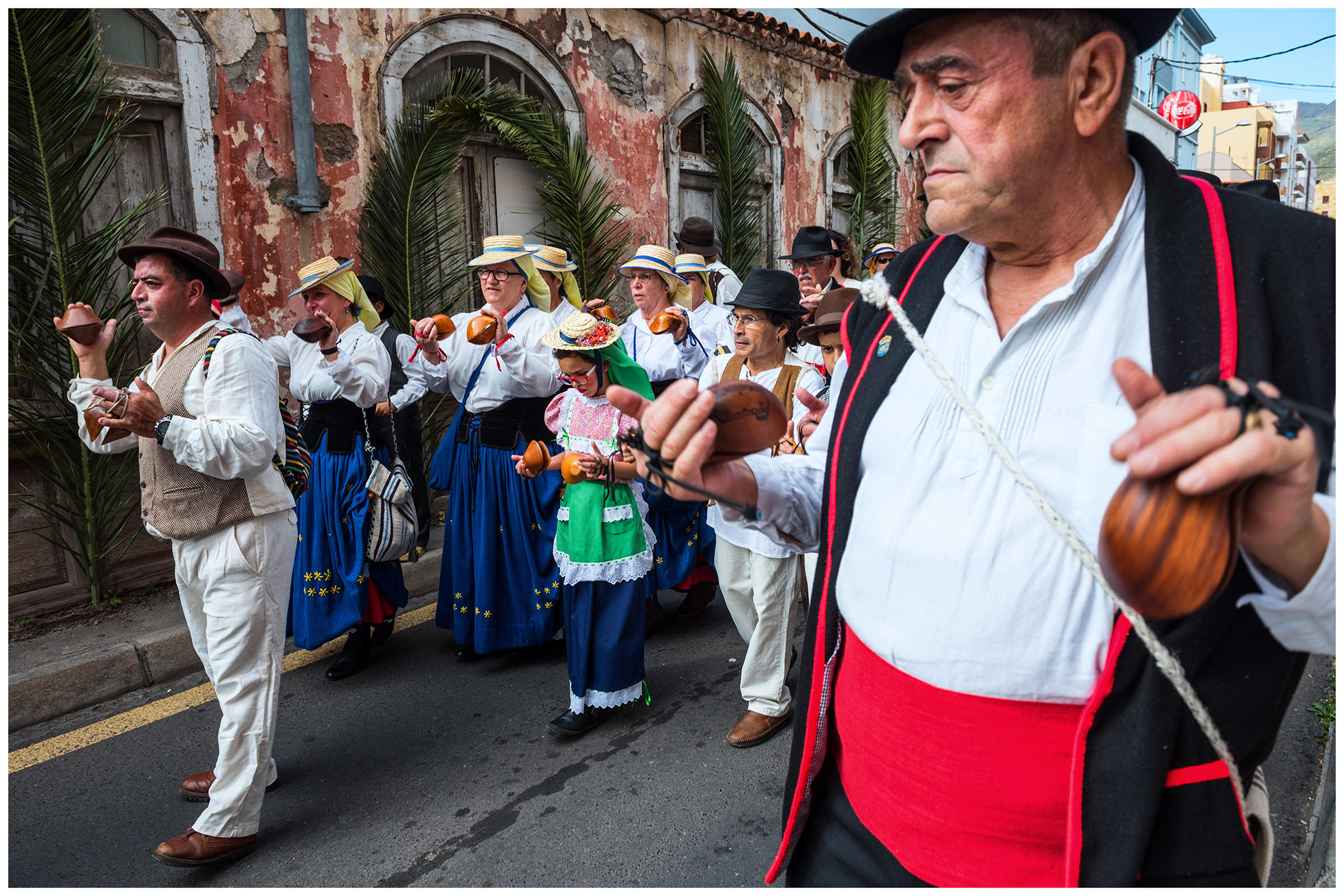 San Sebastian de la Gomera, La Gomera, Canary Islands, Spain. The inhabitants of the city of San Sebastian de la Gomera celebrate the city festival Romeria. Men, women and children play traditional Canarian musical instruments.
