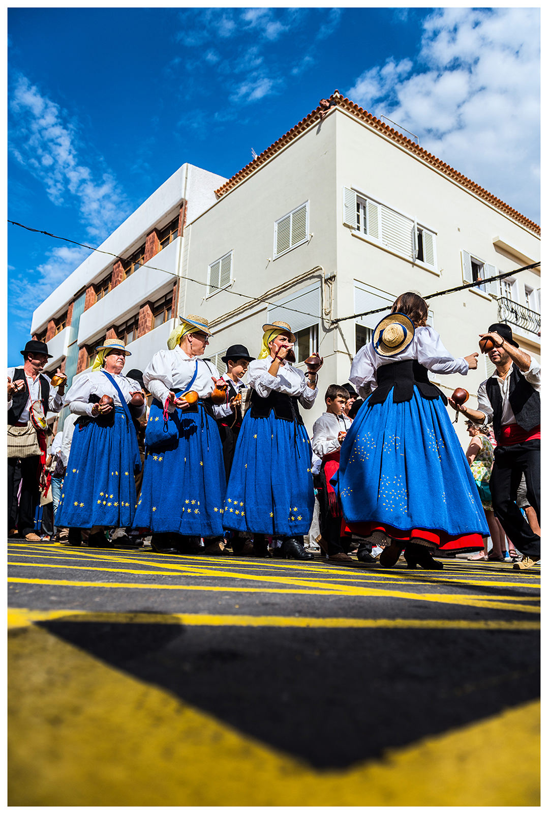 San Sebastian de la Gomera, La Gomera, Canary Islands, Spain. The inhabitants of the city of San Sebastian de la Gomera celebrate the city festival Romeria. Men, women and children play traditional Canarian musical instruments.