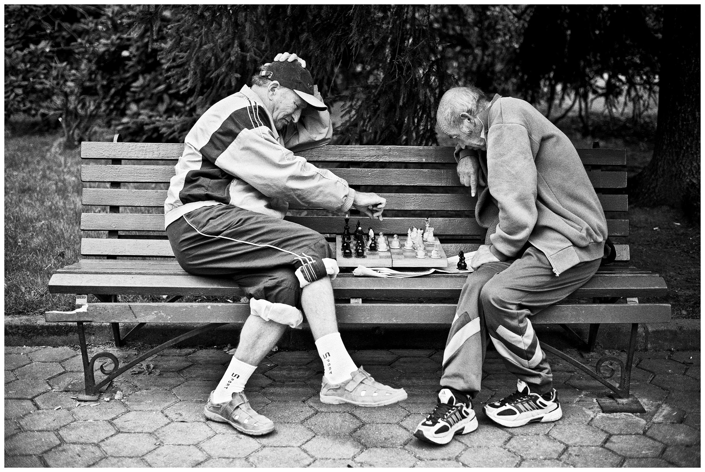 Kaliningrad, Russia. Two men play chess on the street.