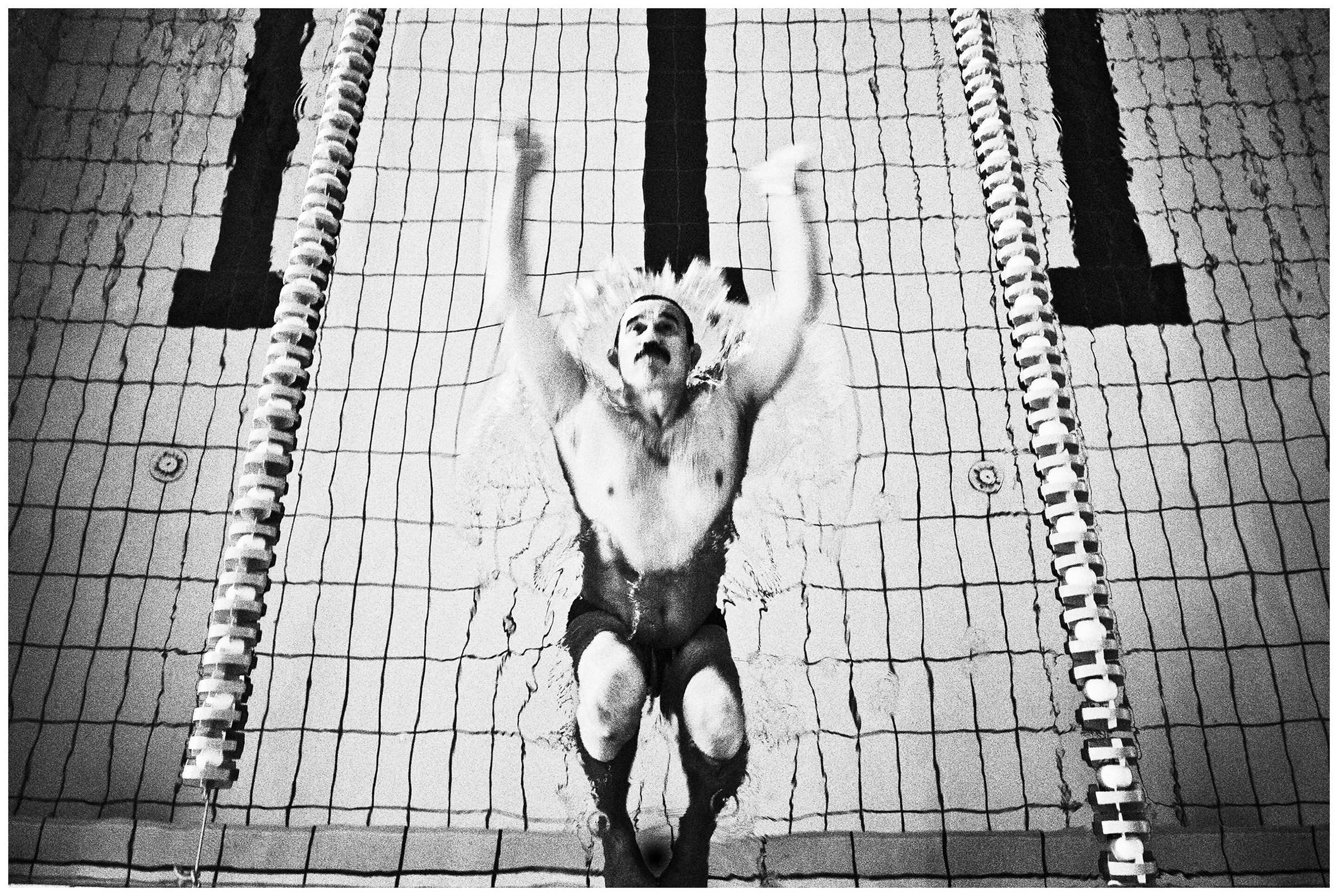 Kaliningrad, Russia. A man swims in a swimming pool.