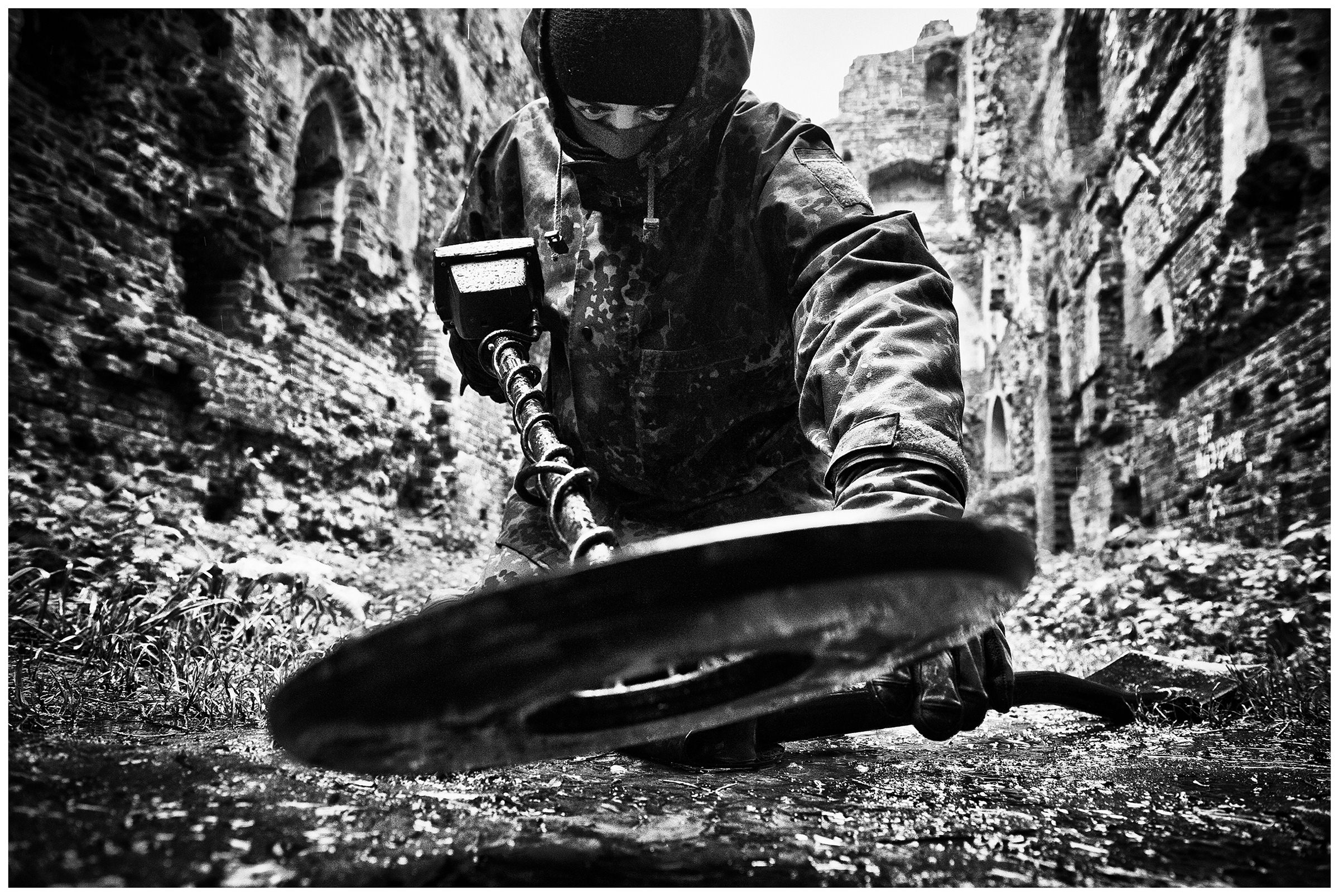 Kaliningrad, Russia. A man with a metal detector working on the site of the Balga Fortress.
