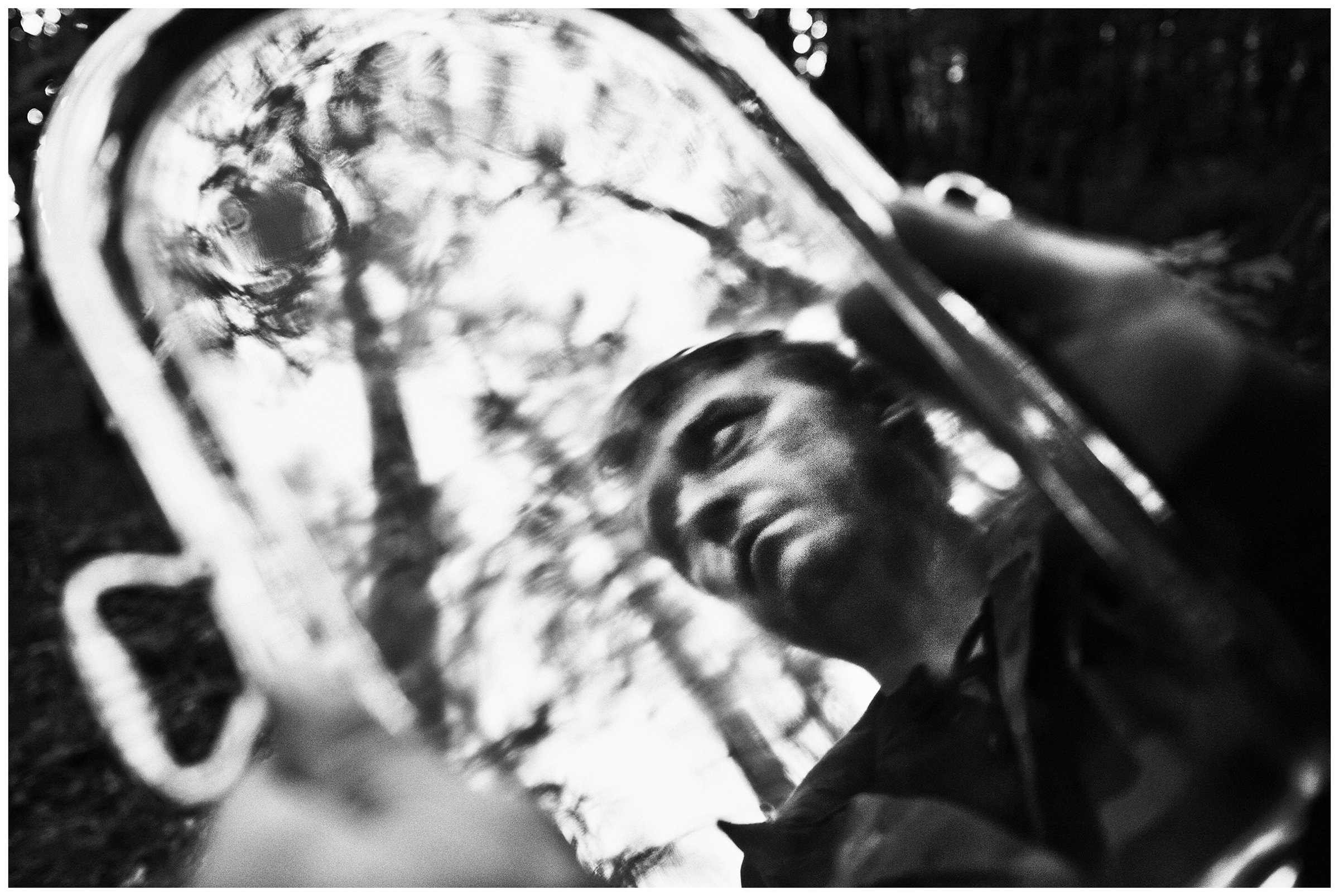 Kaliningrad, Russia. An illegal archaeologist is reflected in a found silver tablet.