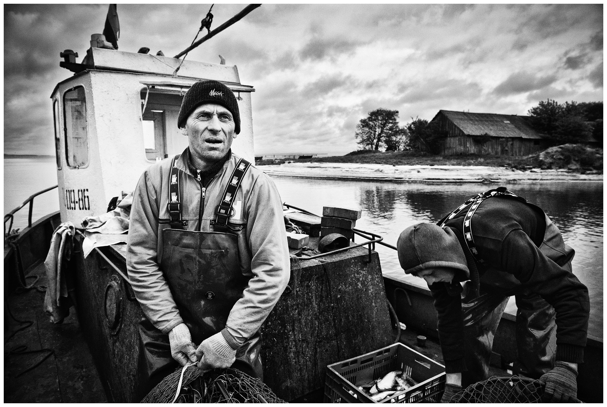 Kaliningrad, Russia. Fishermen get fish out of the nets.