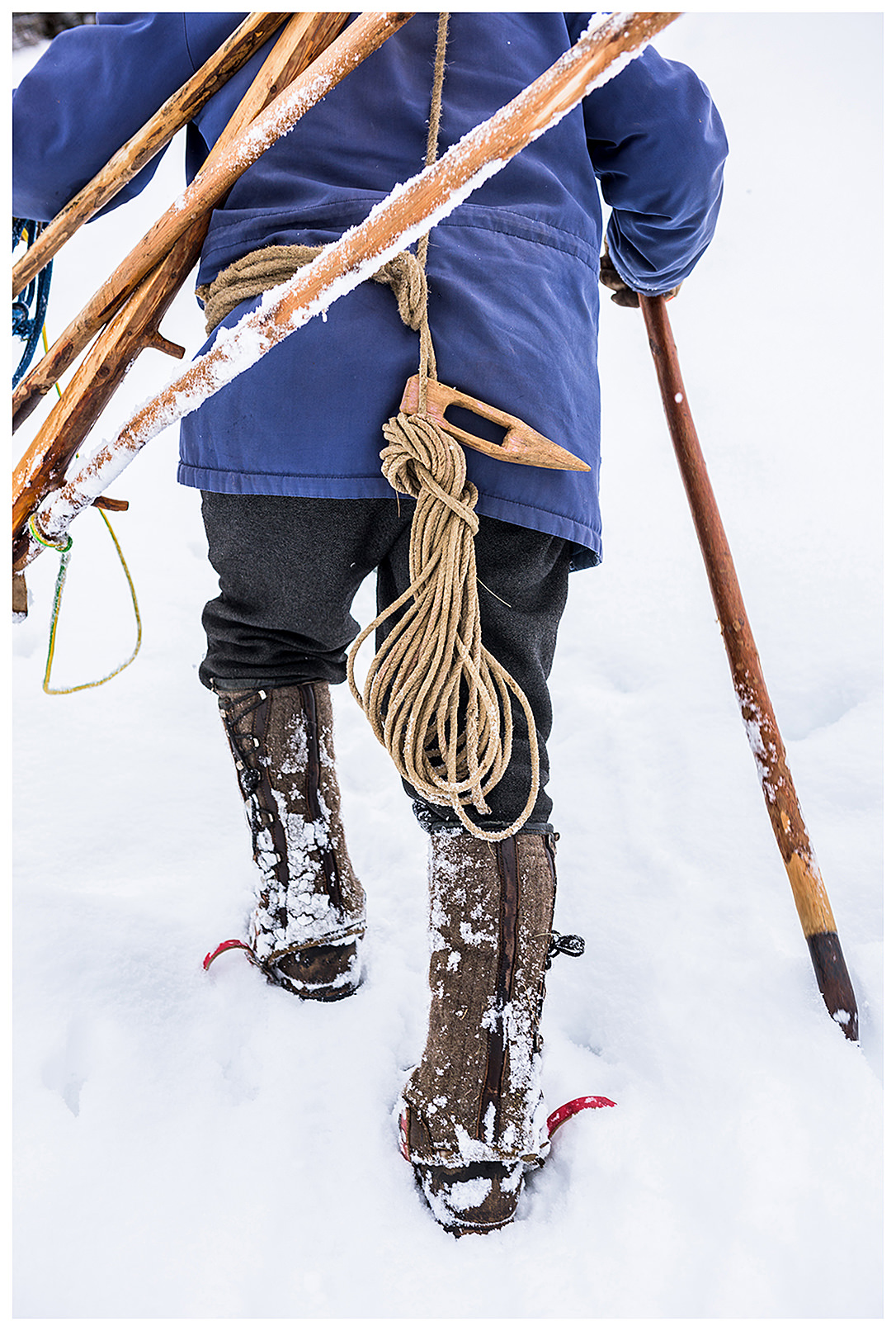 Valsertal, Wipptal, North Tyrol, Austria. Hans Eller, 77, goes up the mountain with his equipment.