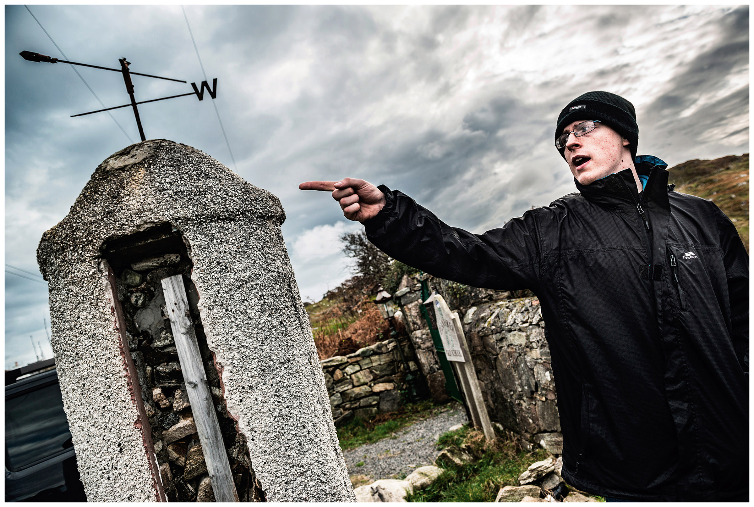Scotland, Isle of Lewis A young man shows the way to the sea. The company "Hebridean Sea Salt" extracts table salt from the sea water.