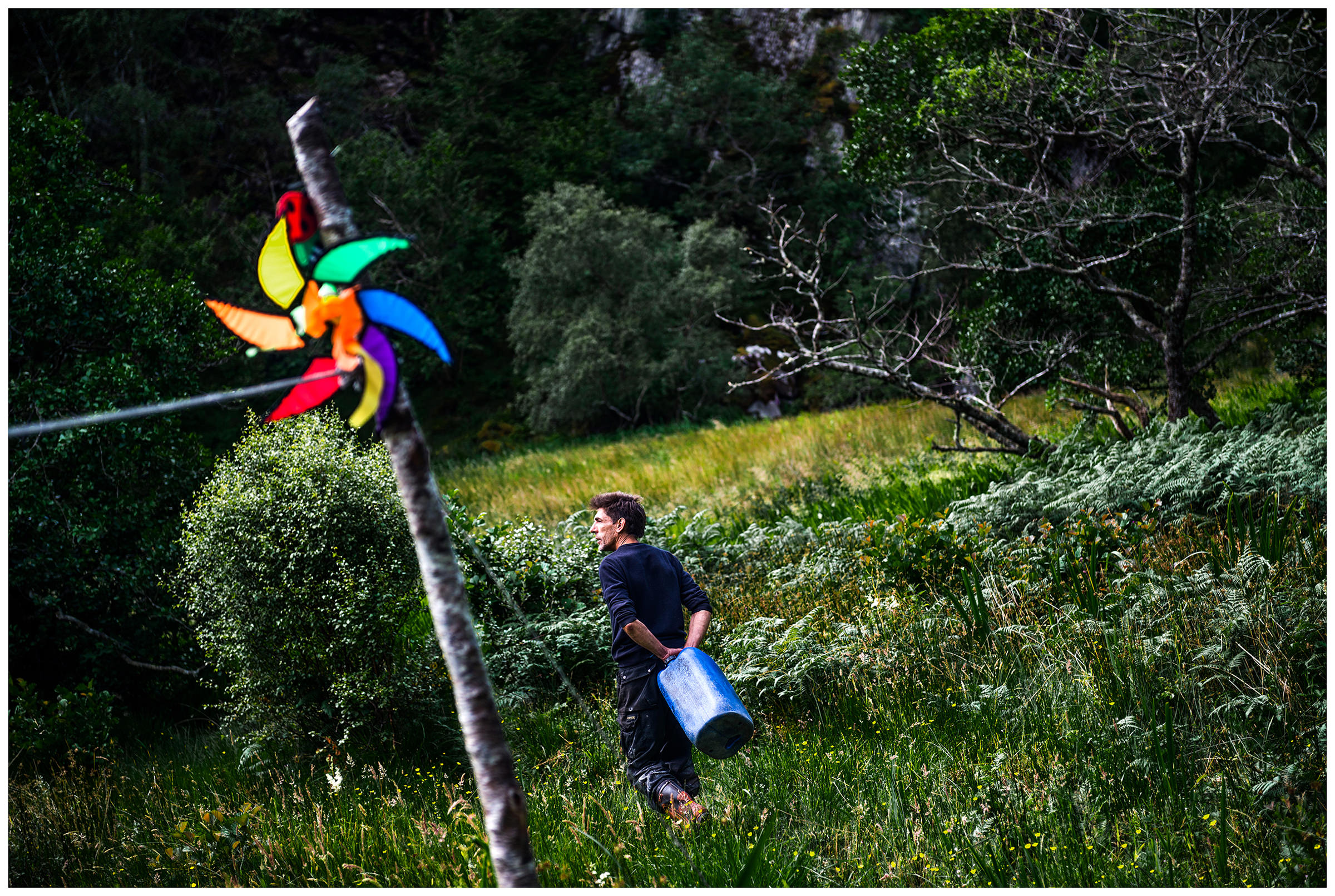 Scotland, near Polish A man goes to get water.