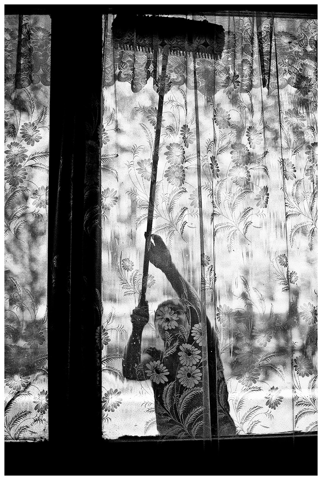 Kaliningrad, Russia. A cleaning lady cleaning windows.
