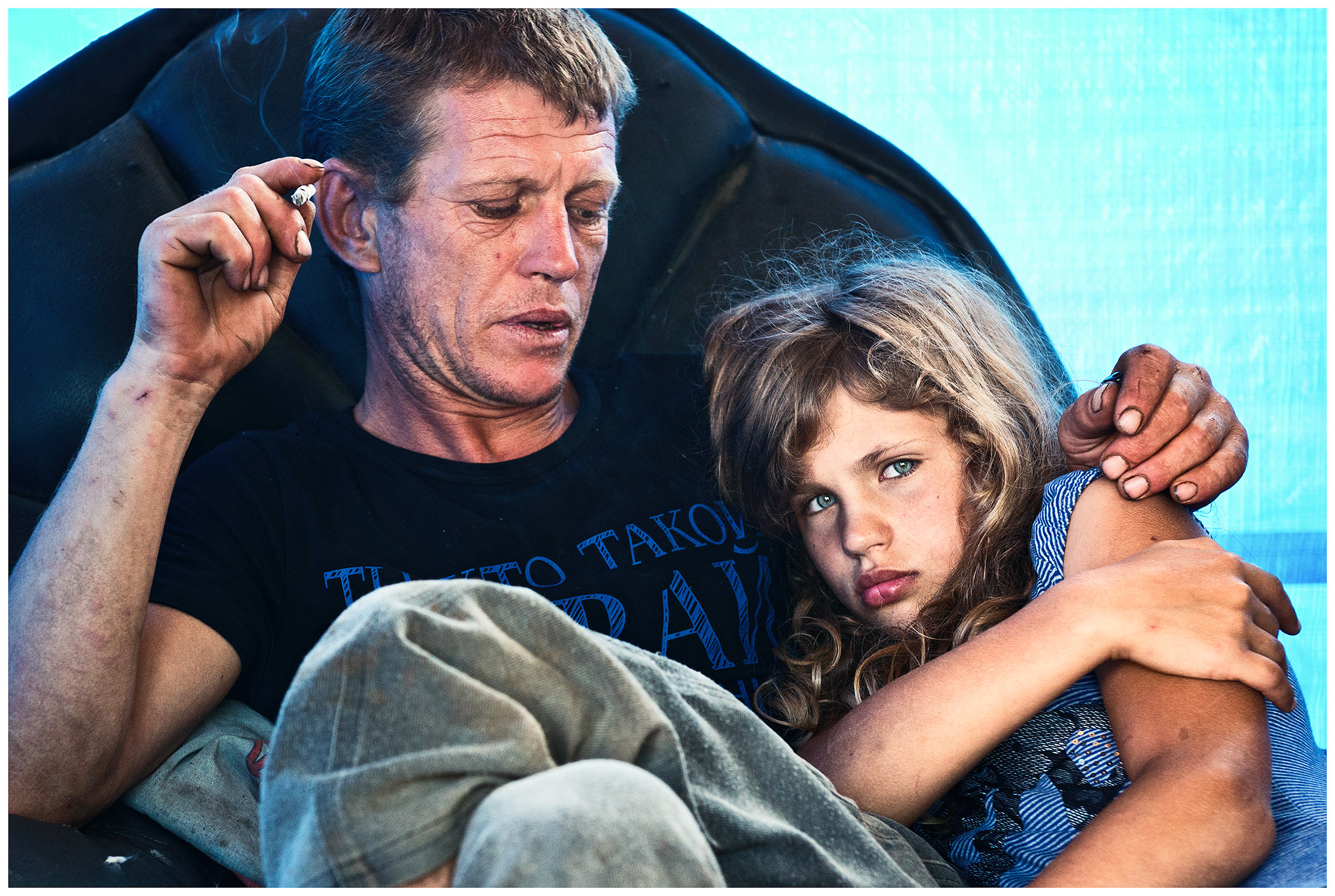 Village Ryazanovka, Primorje, Russia. A poacher recovers after working with his daughter. His main sources of income are sea cucumbers and scallops.