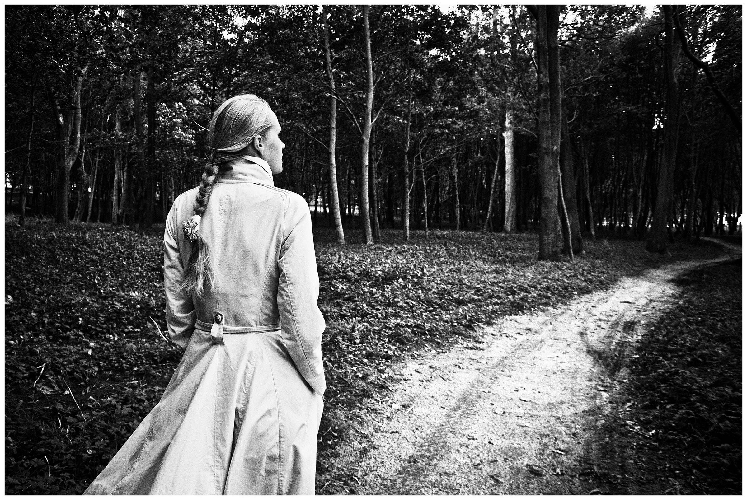 Kaliningrad, Russia. A young woman walks through the Becker Park in Yantarny.