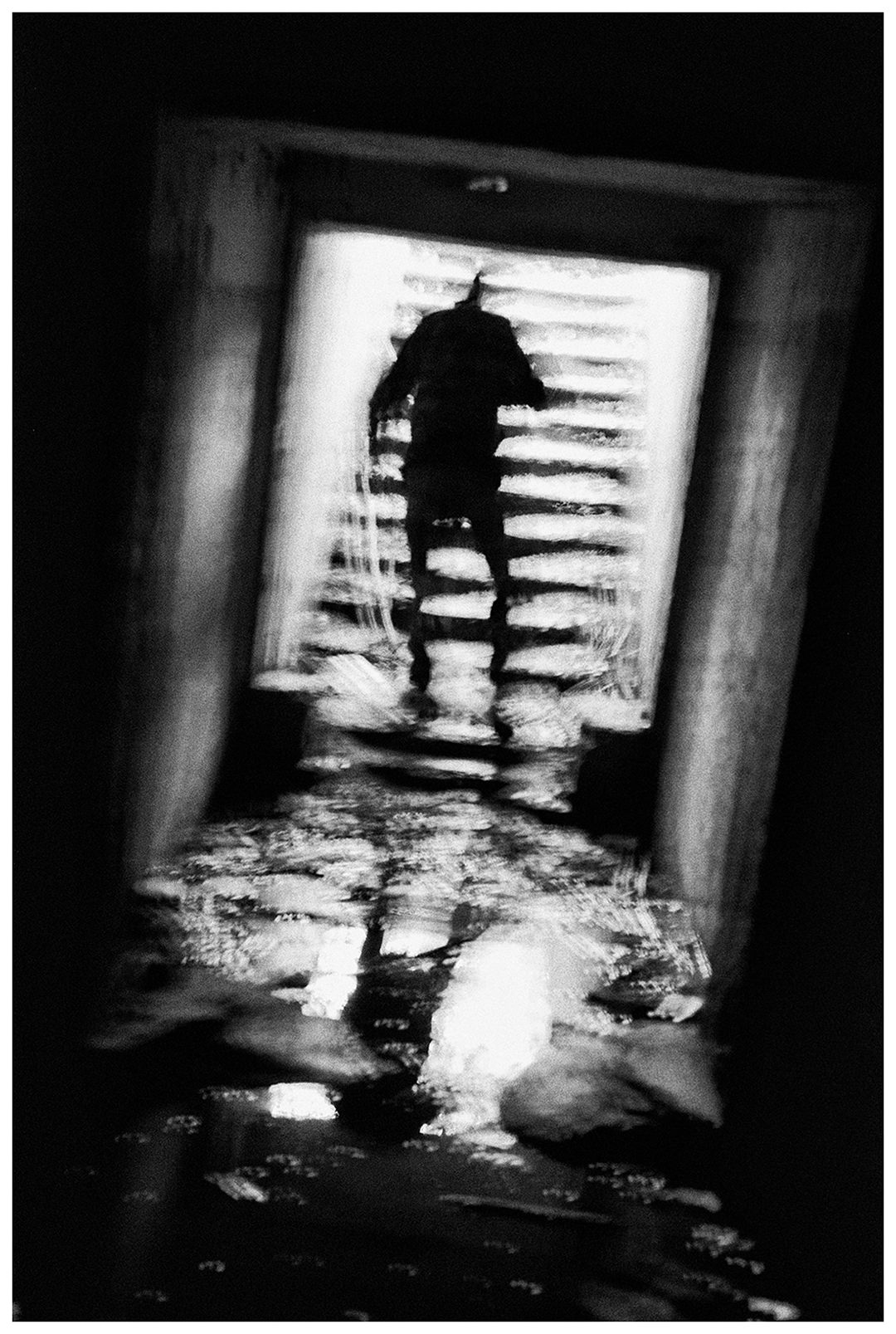 Kaliningrad, Russia. An illegal archaeologist walks through the catacombs.