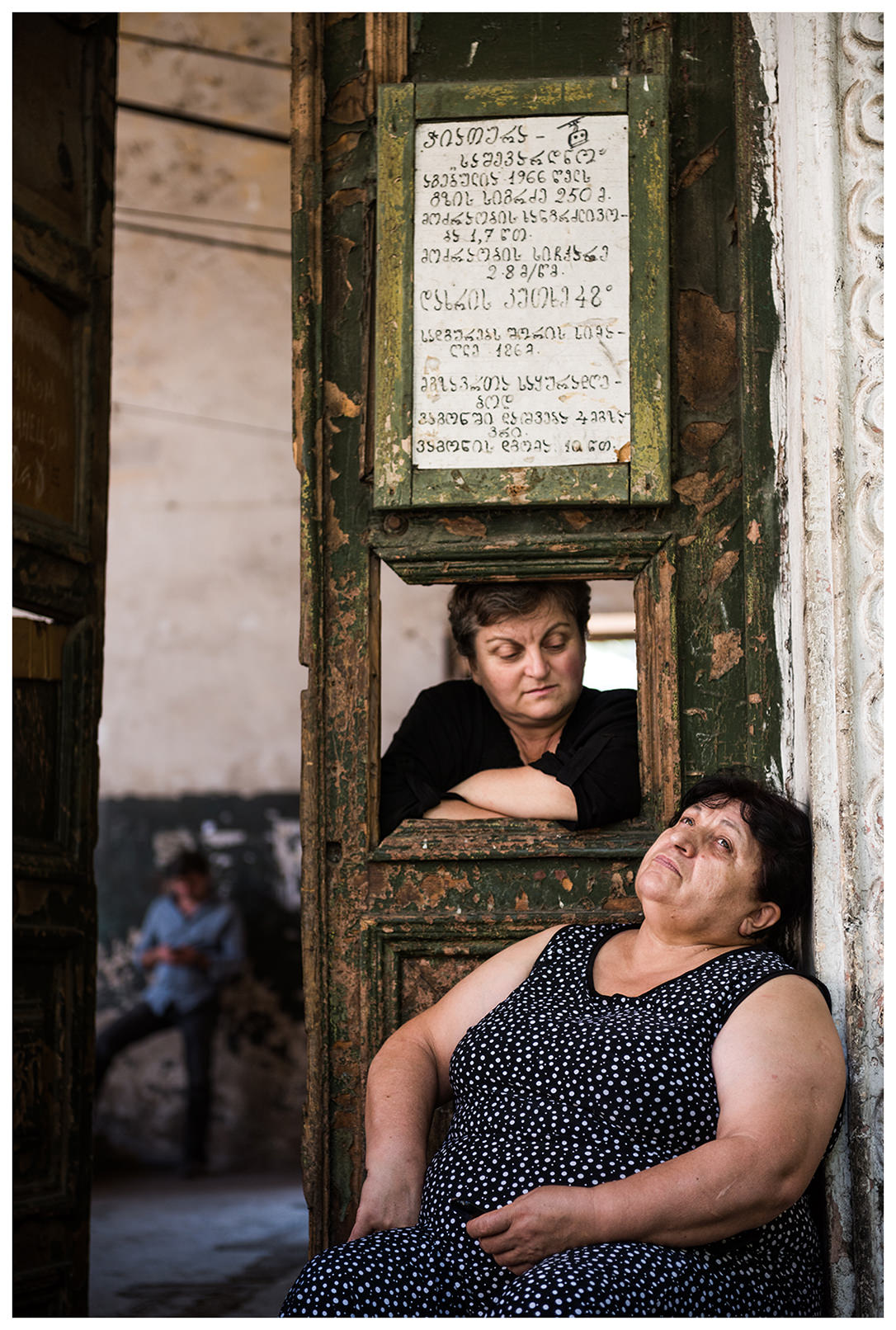 Chiatura, Imeretia, Georgia. The cable car employees are waiting for the departure of a cable car gondola. The gondola of the cable car in Tschiatura is often called the "iron coffin".
