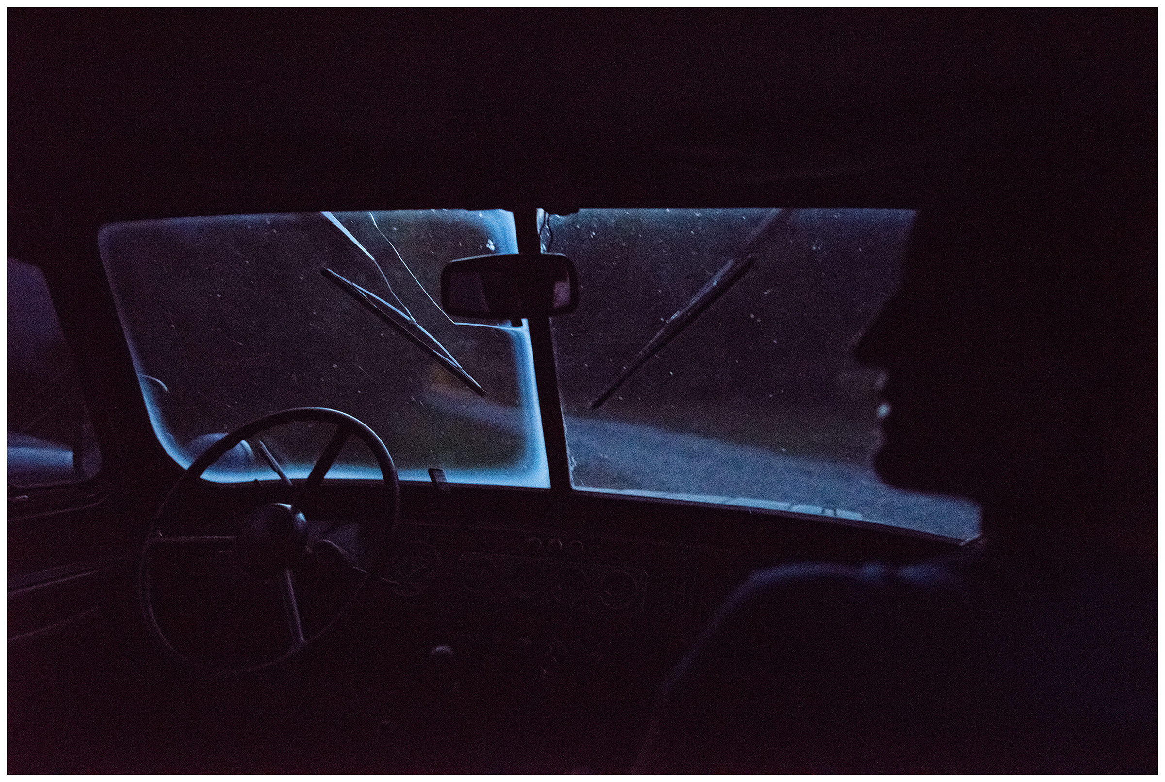 Racha, Georgia. A woman in a Russian off-road vehicle is waiting for the driver to take her from the mountains to the hotel.