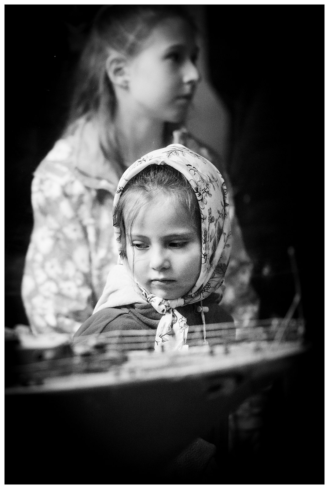 Balaklava, the Crimea. A girl from a tourist group looks at a model of the Russian patrol boat "Pytlivy".