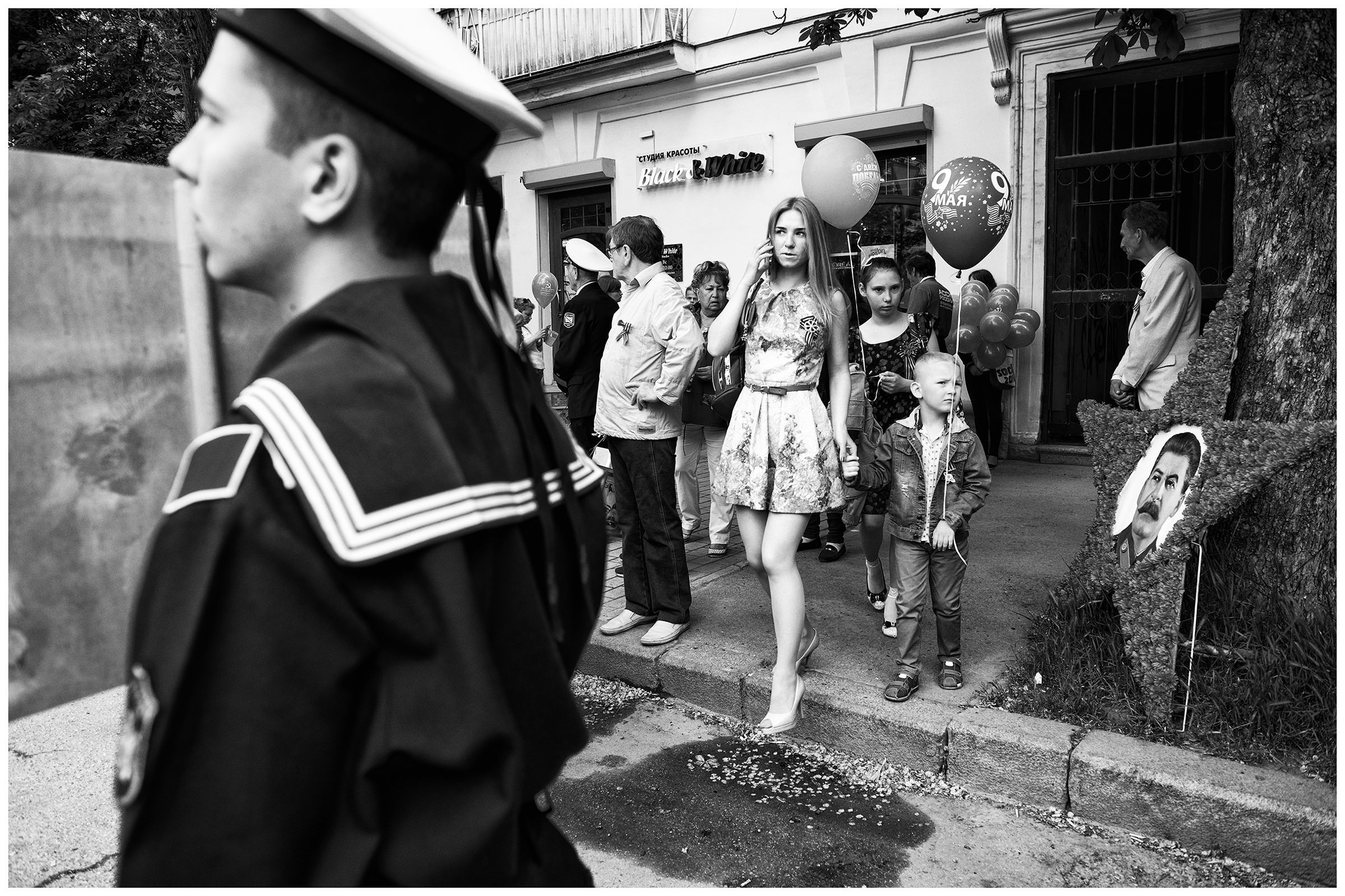 Sevastopol, the Crimea. The participants of the military parade stand at the roadside. The military parade is taking place on the occasion of the victory over Nazi Germany on May 9.