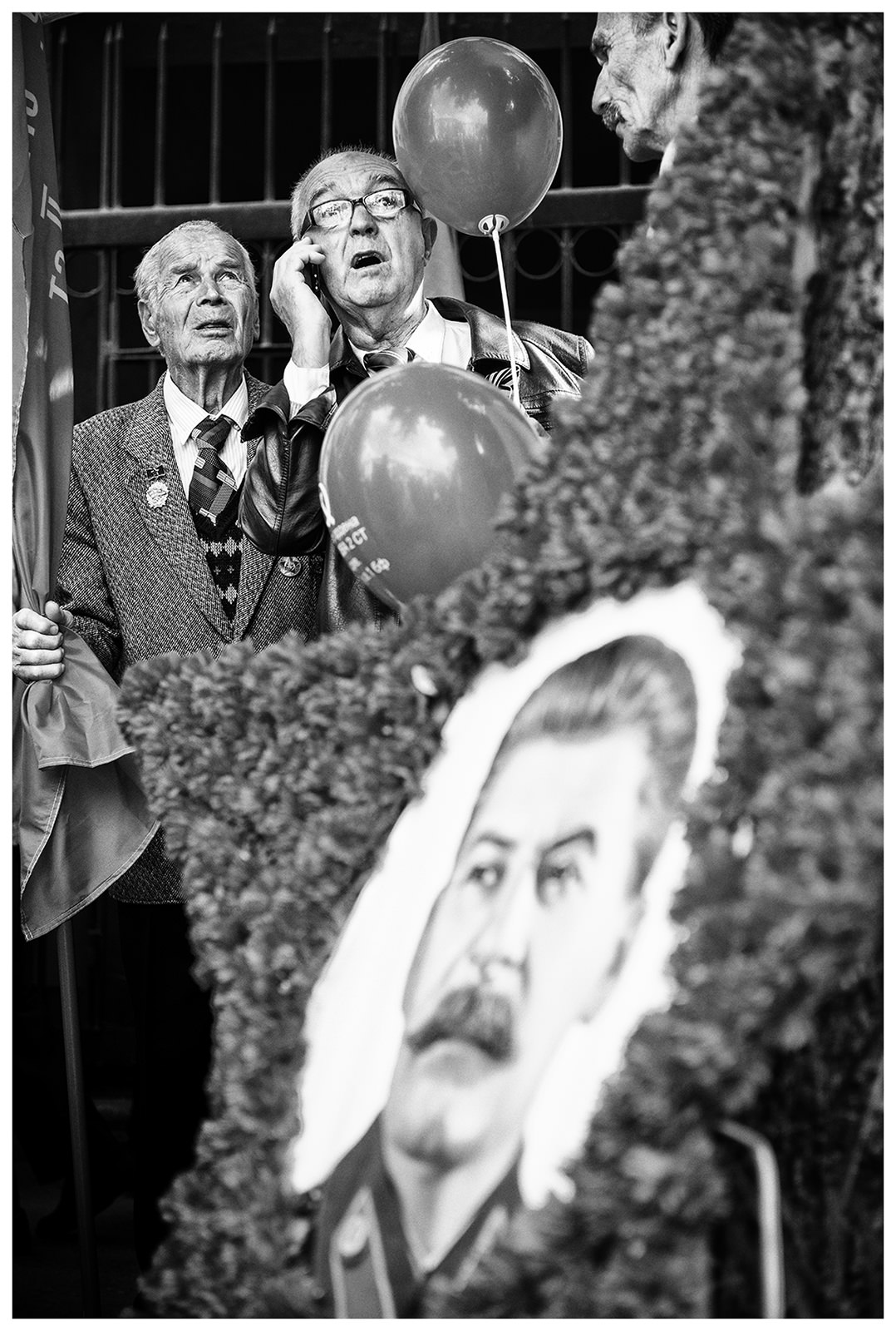 Sevastopol, the Crimea. The participants of the military parade stand at the roadside next to a portrait of Stalin. The military parade takes place on the occasion of the victory over Nazi Germany on May 9.