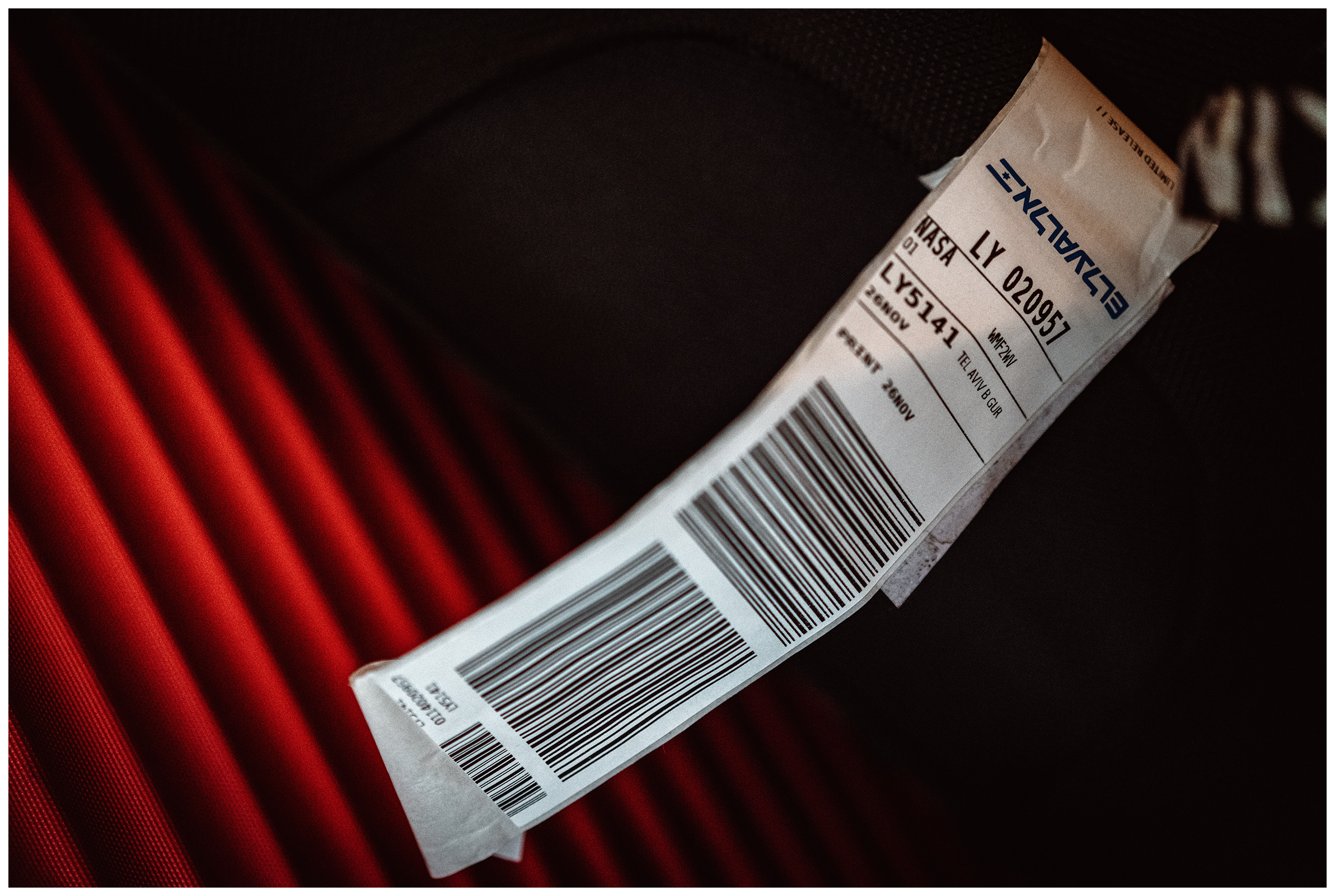 Miliou, Cyprus. A suitcase with an airport slip from Tel Aviv stands in front of the exit to the Wellness Retreat Secret Forest.