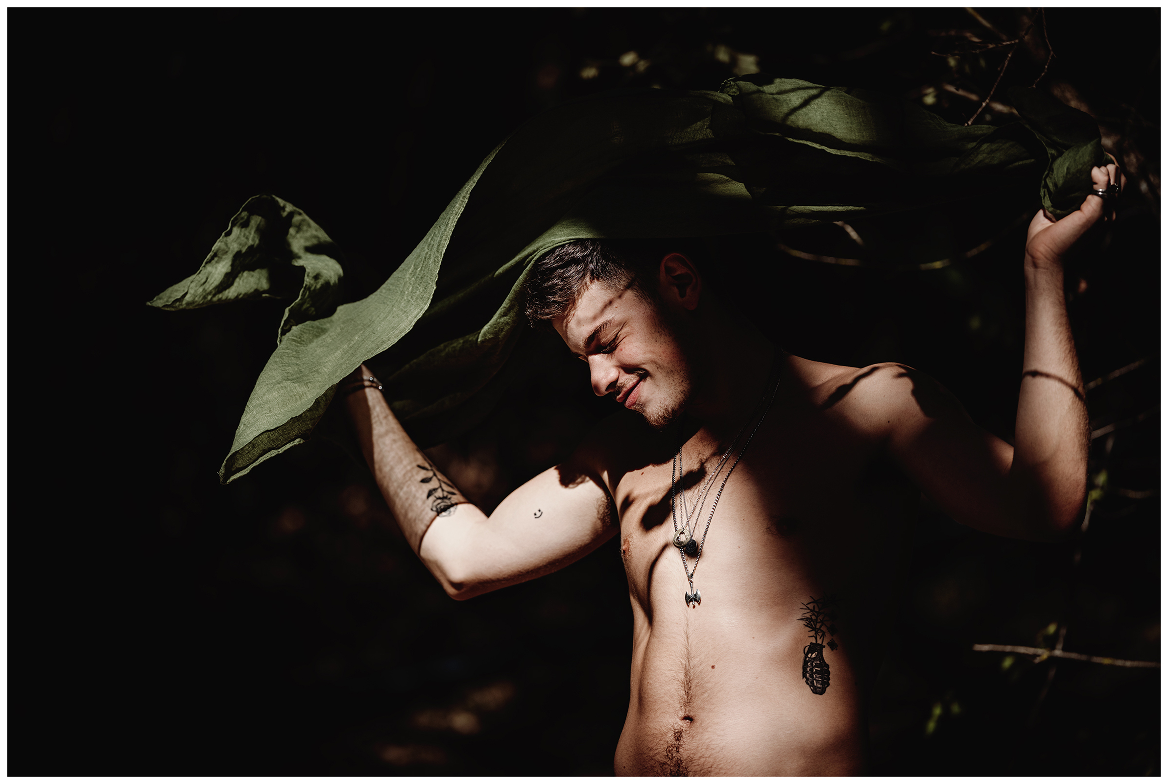 Miliou, Cyprus. A young man from Israel dances in a forest during dance therapy.