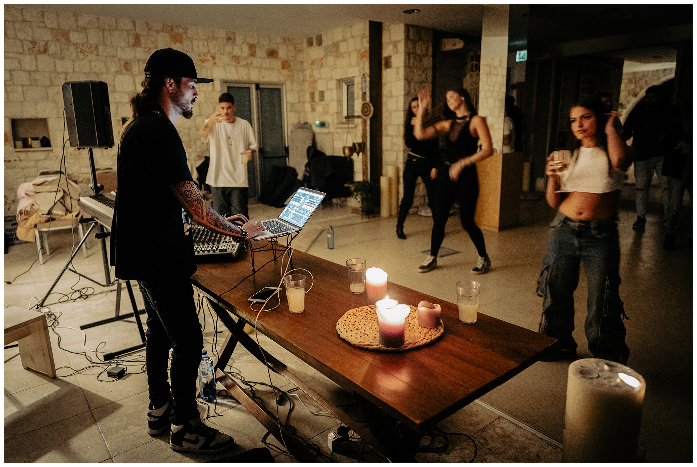 Miliou, Cyprus. Young Israelis dance to rave music late in the evening at the Secret Forest wellness retreat.
